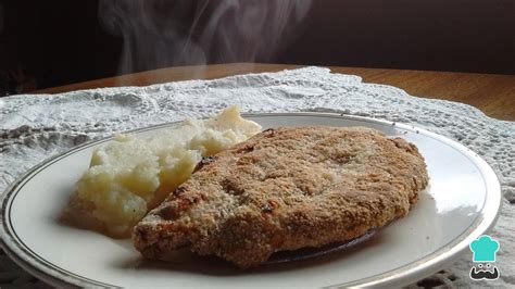 Proceso de empanado de una milanesa de carne con avena