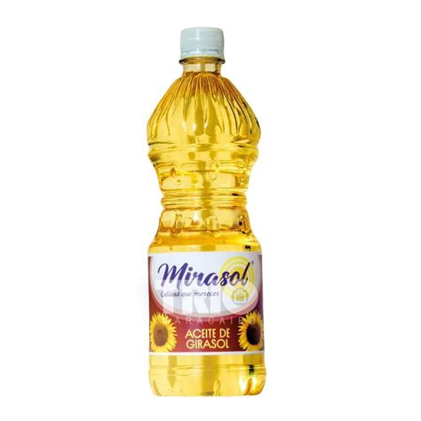 Foto de aceite de girasol en un estante de supermercado, con etiquetas de productos veganos al fondo