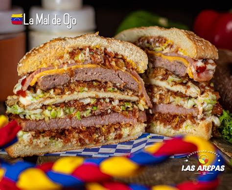 Esquema de las capas de una hamburguesa venezolana con sus múltiples ingredientes
