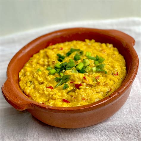 Foto de humita en olla en un plato