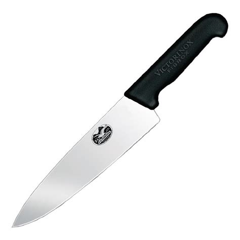 Cuchillo de chef con hoja ancha y curva, mostrando su versatilidad