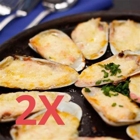 Machas con queso parmesano listas para hornear