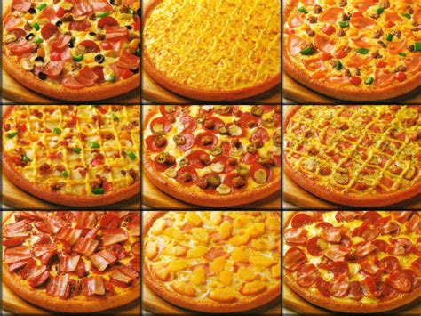 Foto de una variedad de pizzas de Slicy Rocks Pizza