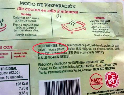 Paquete de poroto carioca con la etiqueta de OGM en un triángulo amarillo con la letra 'T' y el texto 