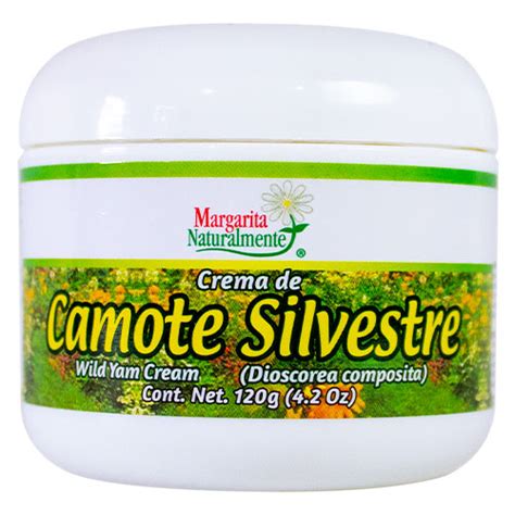 Foto de un envase de crema de camote silvestre junto a una flor de camote