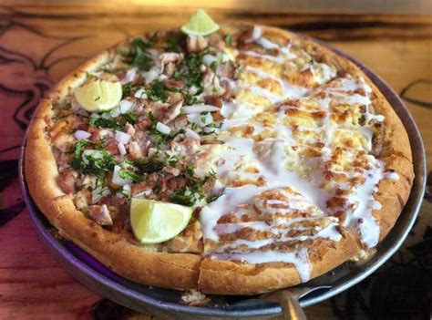 Fachada o interior de Pizzas del Perro Negro