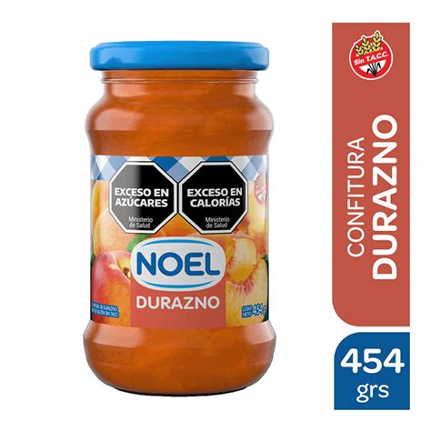 Mermelada de durazno en un frasco con cuchara