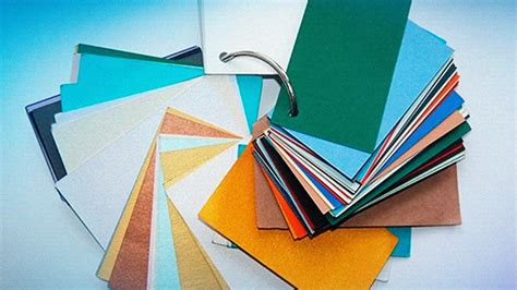 plegador de papel y diferentes tipos de papel para origami