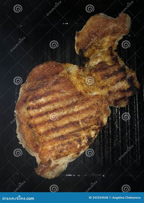 Foto macro de carne con lesiones anómalas en forma de esferas o perlas de grasa