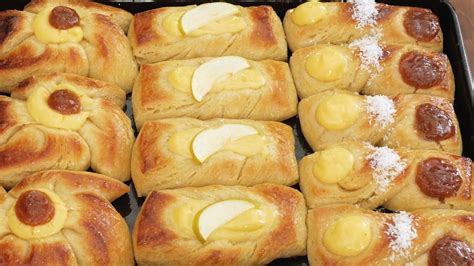 Foto de varias facturas argentinas terminadas con diferentes rellenos (crema pastelera, dulce de leche, membrillo)
