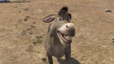 Shrek explicando a Burro la metáfora de las cebollas