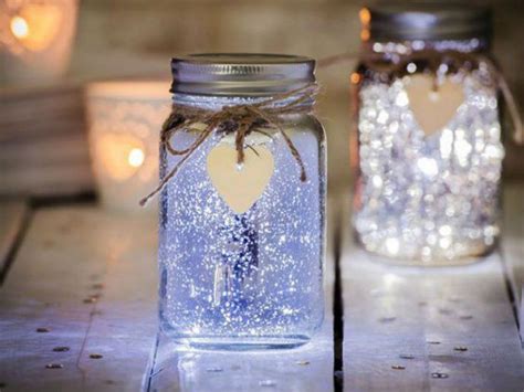 Frascos de vidrio con luces LED o velas colgantes
