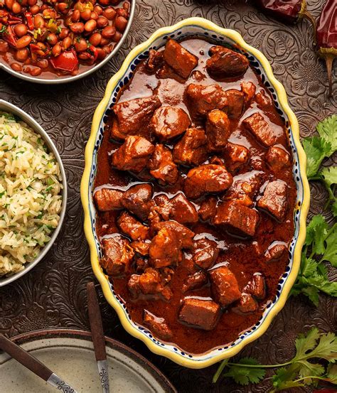 Plato de asado de puerco con tortillas de harina y arroz