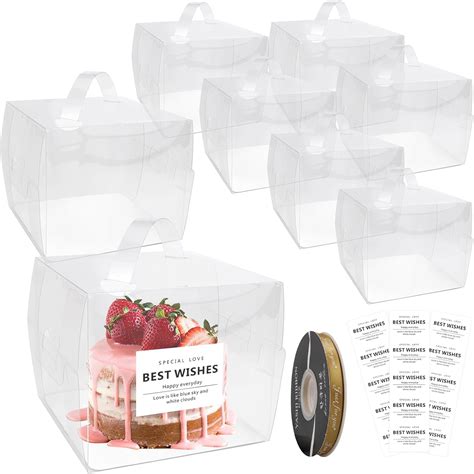 Foto de varias cajas plásticas redondas transparentes para mini tartas, mostrando la visibilidad del producto