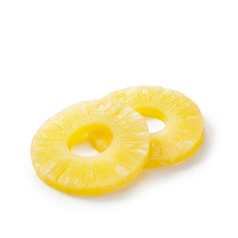Rodajas de piña natural cortadas y listas para cocinar.