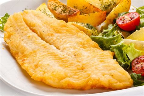 Plato de filete de pescado con jengibre y cítricos