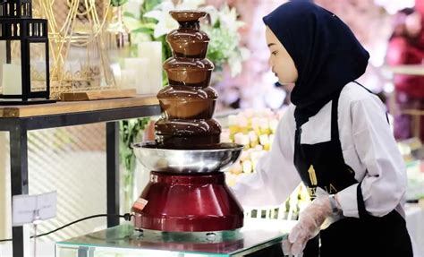 Infografía paso a paso para limpiar una fuente de chocolate
