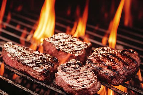 Foto de carnes y pescados a la brasa, especialidad del Asador La Pradera en O Rosal