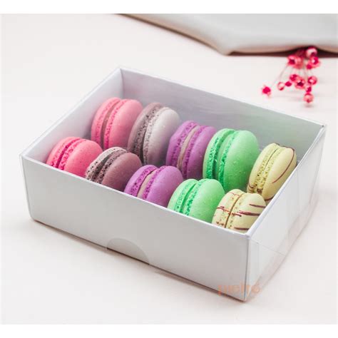Ilustración de diferentes cajas para 10 macarons con sus medidas y colores.