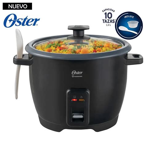Diseño moderno de una olla arrocera Oster con tazón removible y tapa de vidrio.
