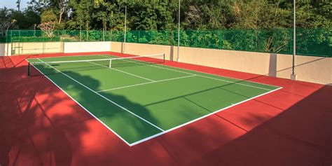 Venus Williams en una pista de tenis, representando el alto rendimiento deportivo basado en una alimentación vegetal.
