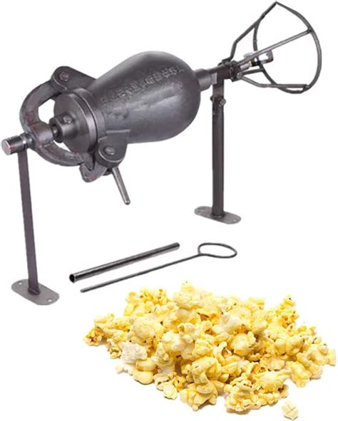 Fotografía antigua de una máquina de palomitas de maíz de vapor.