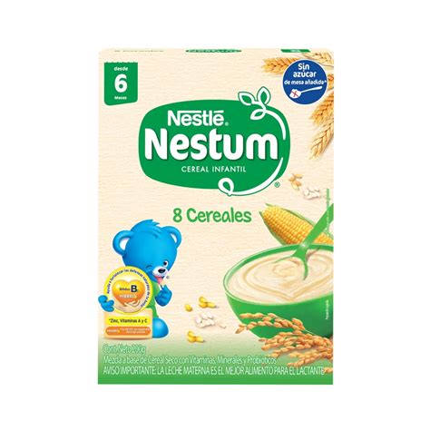 Bebé sonriente disfrutando de su cereal Nestum 3 Cereales