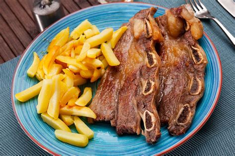 Preparación de churrasco a la parrilla