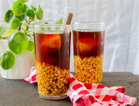 Vaso de mote con huesillos con duraznos y trigo