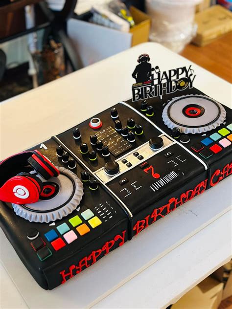 Thematic photo of a cake with a microphone or DJ headphones