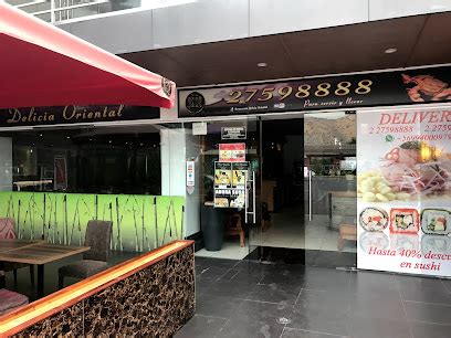 Fachada de restaurante Delicia Oriental en Huechuraba con señalética de sushi y comida china