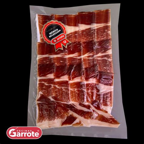 Jamón en lonchas envasado al vacío y etiquetado para congelar