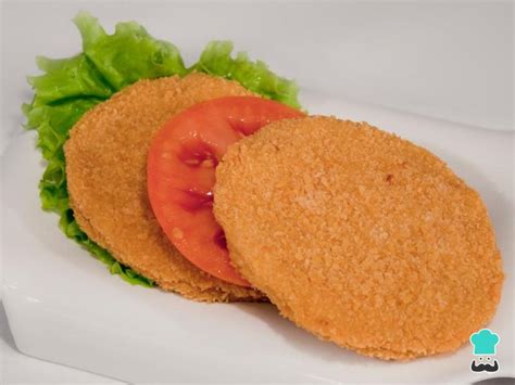Infografía con los pasos de la receta de medallones de pollo con queso y espinacas.