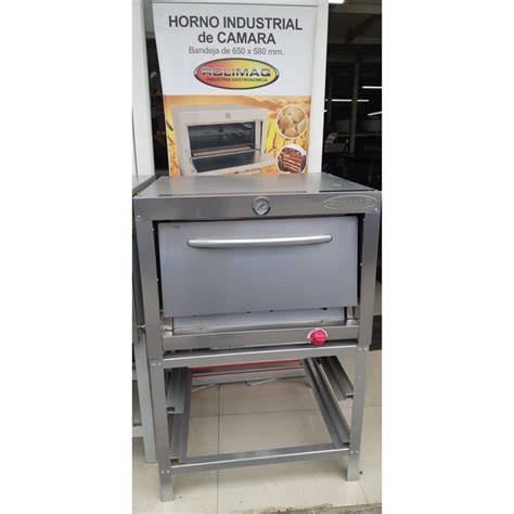 Fotografía frontal del horno semi-industrial ROLIMAQ, mostrando el frente de acero inoxidable y el reloj de temperatura.