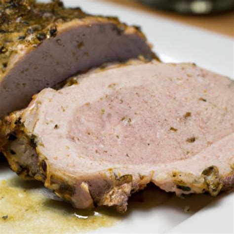 Lomo de cerdo en Thermomix, con ingredientes frescos y el robot de cocina visible