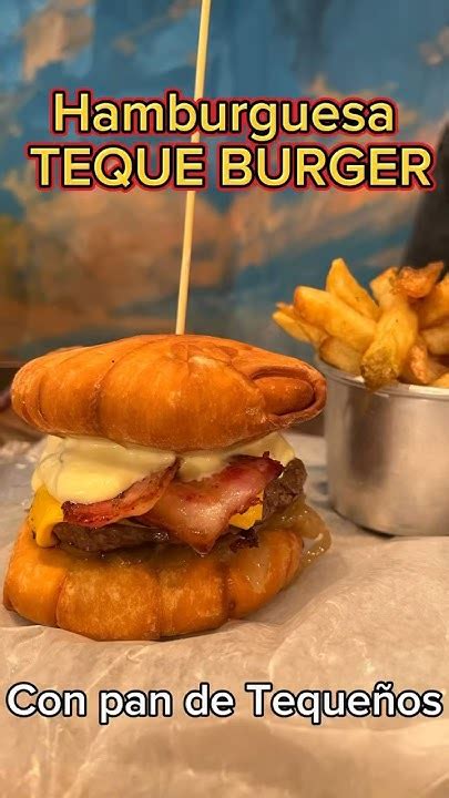 Esquema visual de una hamburguesa con pan de tequeño mostrando las capas: tequeño exterior, carne, vegetales y aderezos.
