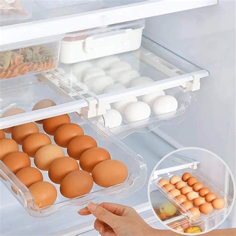 Esquema sobre la colocación correcta de huevos en la heladera, lejos de olores fuertes y en la parte central o superior