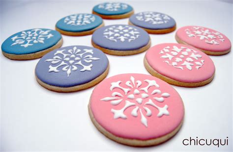 Ilustración o fotografía de galletas decoradas sin gluten, con temática del Día de la Mujer.
