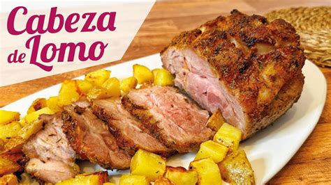 Plato final de cabeza de lomo de cerdo al horno con salsa y guarnición de patatas y guisantes
